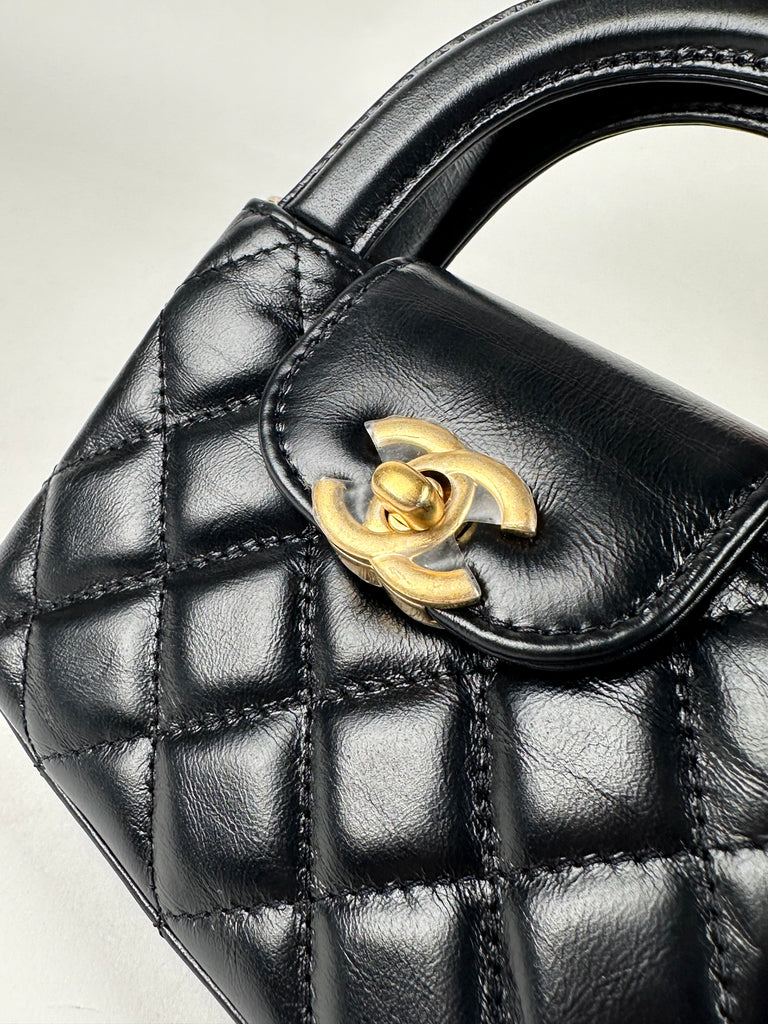 Chanel Shiny Aged Calfskin Quilted Mini Nano Kelly Top Handle Black