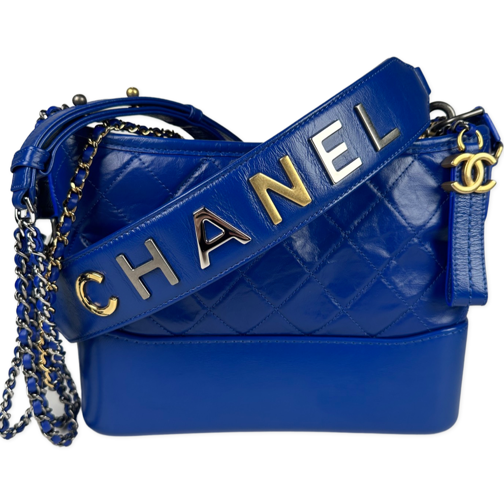 Chanel Aged Calfskin Quilted New Medium Gabrielle Logo Top Handle Blue –  Sacdelux