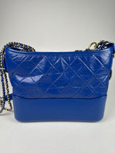 Load image into Gallery viewer, Chanel Aged Calfskin Quilted New Medium Gabrielle Logo Top Handle Blue
